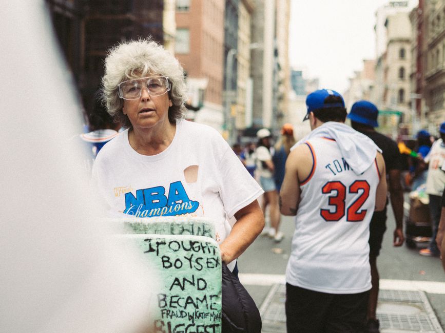 Colorful urban street scene with diverse crowd in sports attire